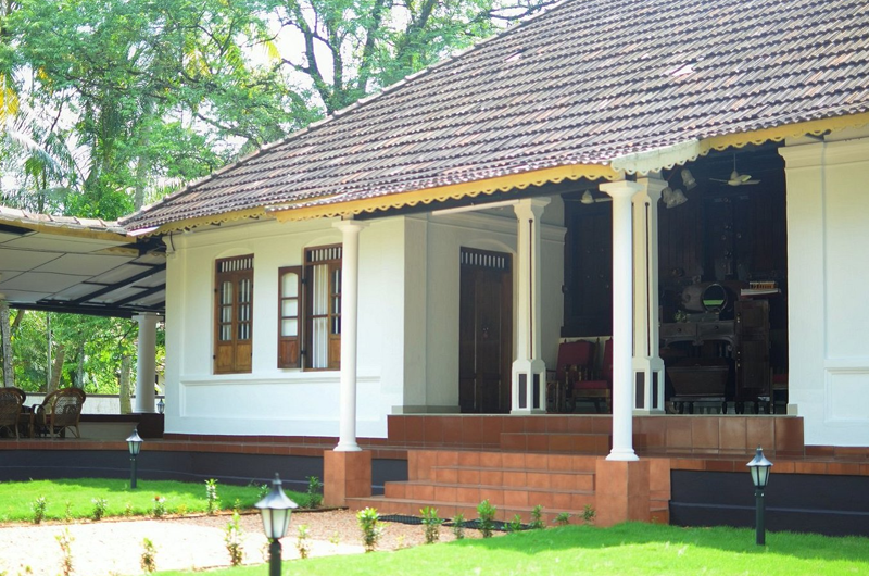Entrance front view of Babira Brookside Heritage Resort Kumarakom with natural ambiance