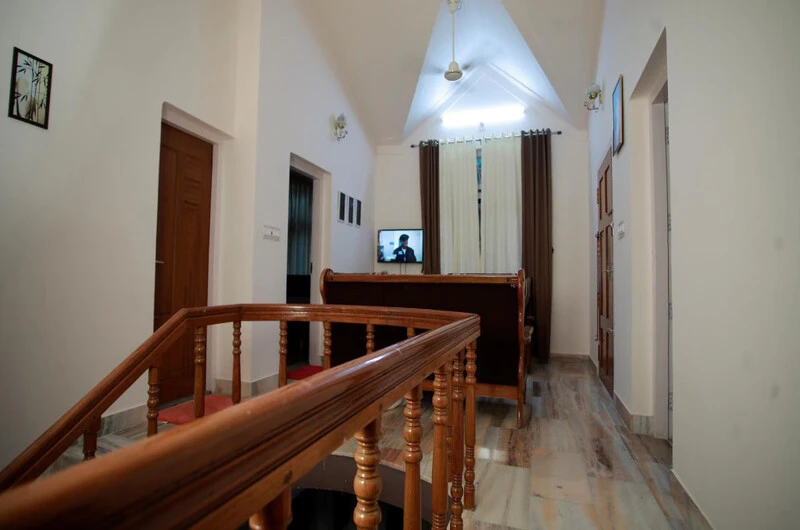 Traditional Kerala-style interior at Green Nestle Heritage Homestay Kumarakom
