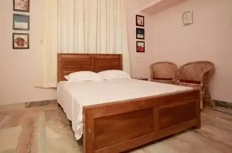 Cozy bedroom at Green Nestle Heritage Homestay Kumarakom