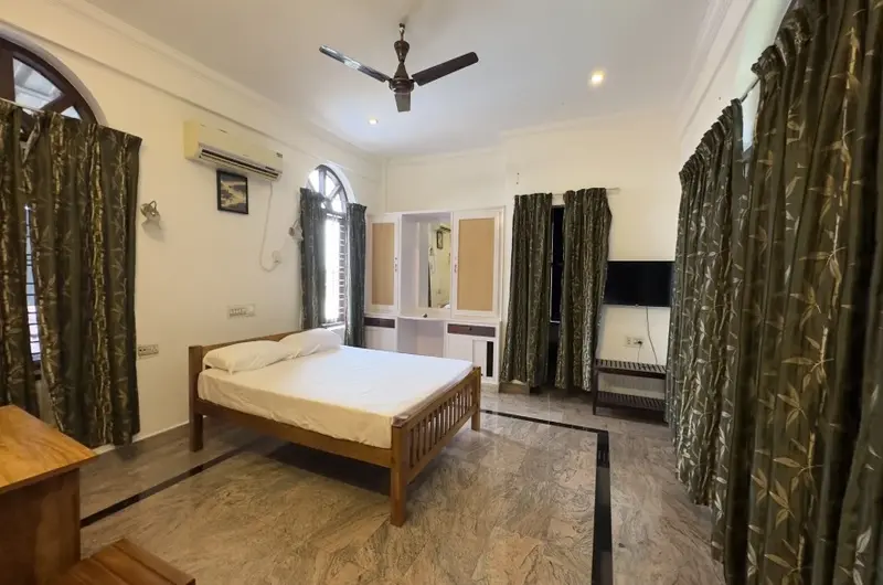 Classic heritage bedroom interiors at Lakshmipuram Palace Homestay